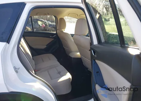 2014 Mazda Cx-5 Touring z USA, uszkodzony, nr VIN JM3KE4CY0E0354411